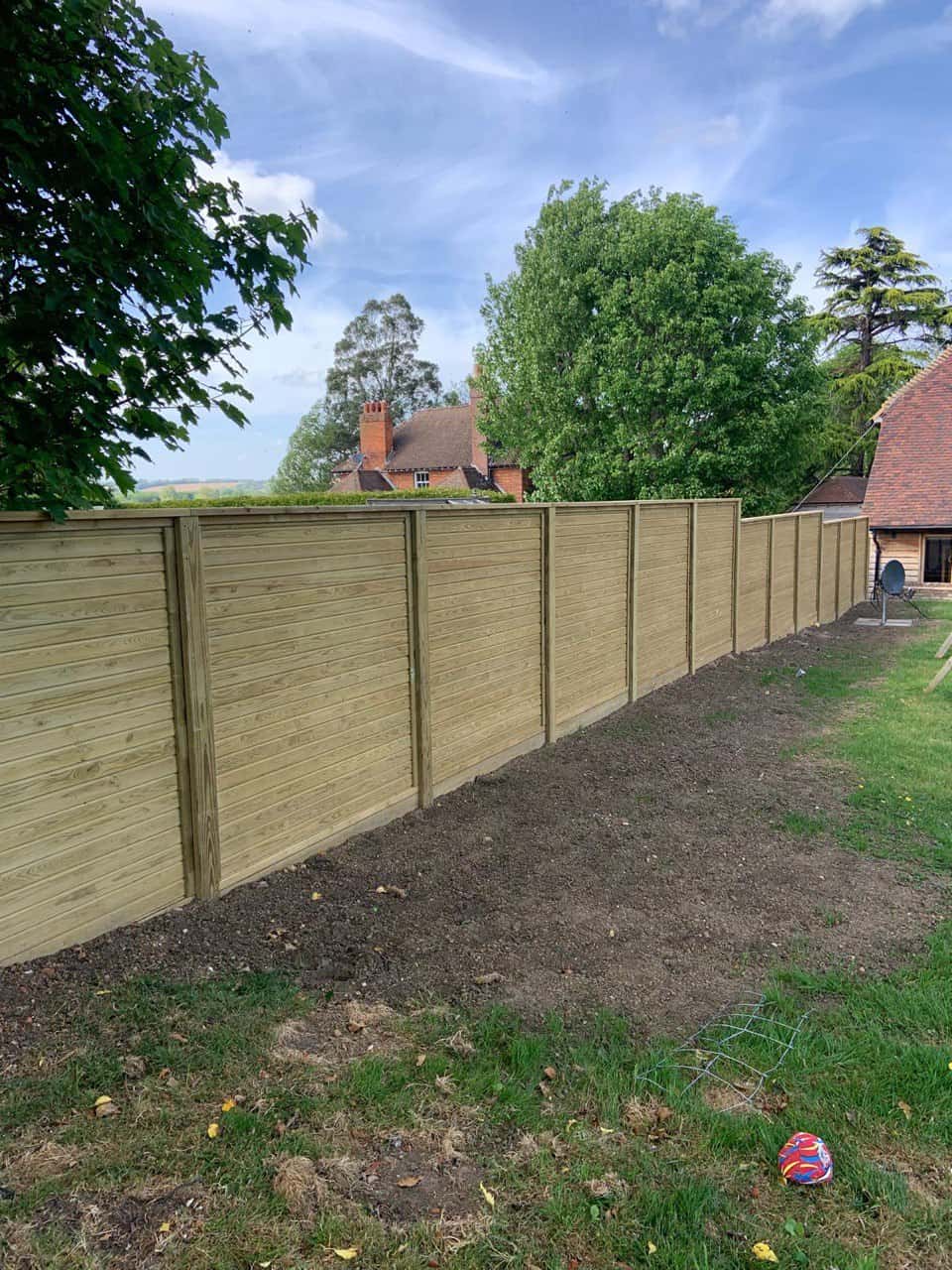 This is a photo of an acoustic fence installed by Fast Fix Fencing Caterham